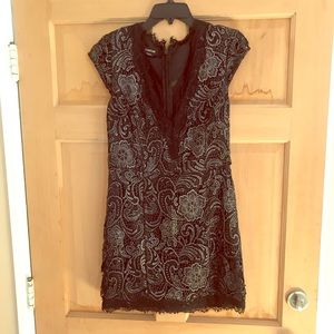 Classy black Bebe dress with cap sleeves